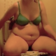 A plump girl records herself taking a piss and a shit while sitting on a toilet. She wipes her ass, shows us her dirty toilet paper. Audible pooping, but unfortunately, not a high-resolution video. Over 1.5 minutes.